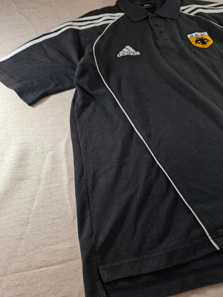 000127 – Adidas AEK Athens Polo – Black, Size L (UK 42/44)