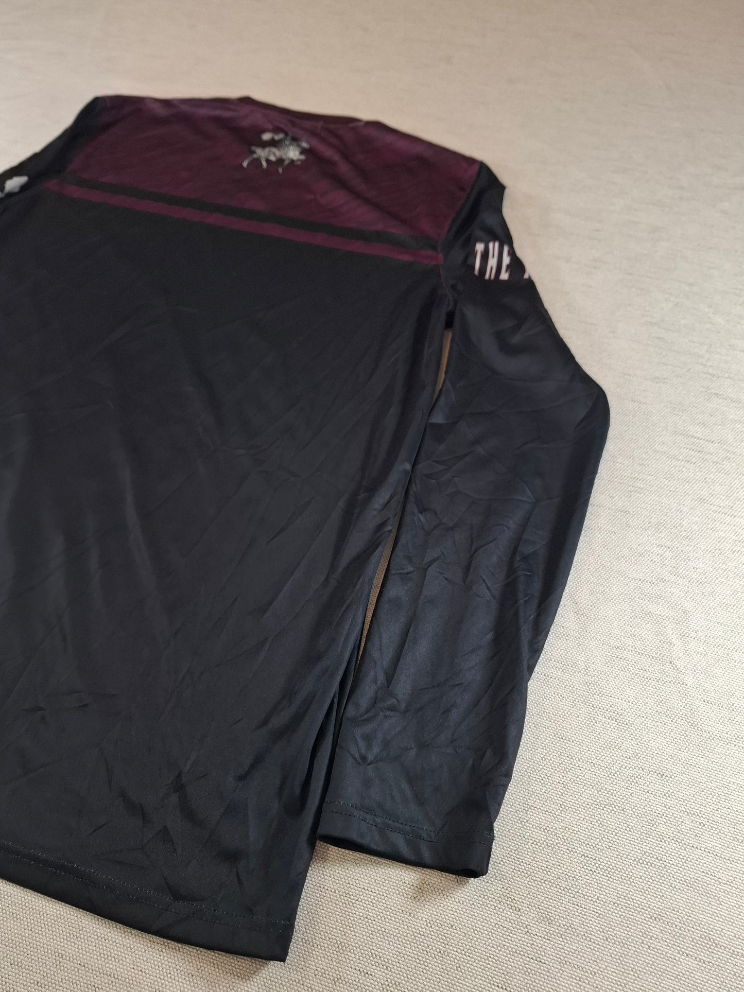 001236 Under Armour longsleeve t-shirt size M Purple/ Black. Lancers.