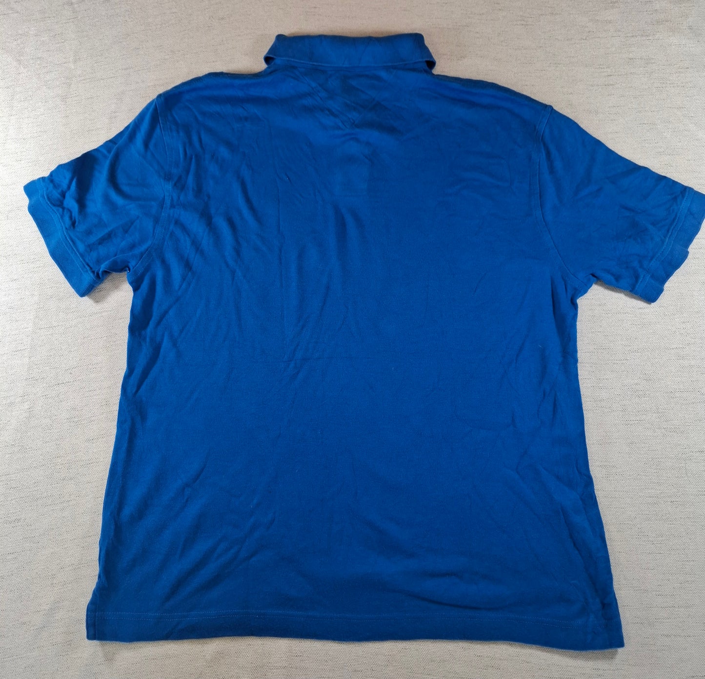 001244 Tommy Hilfiger Polo shirt size L Blue