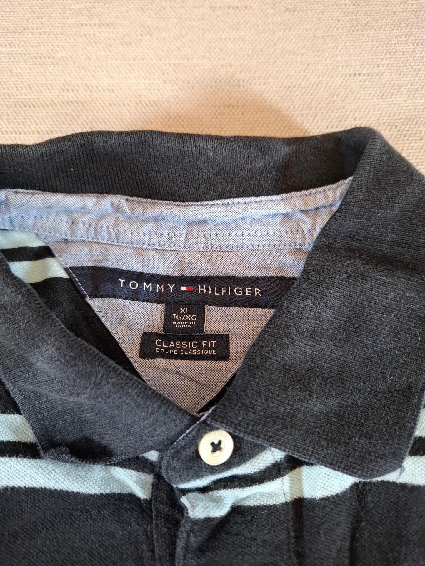 001299 Tommy Hilfiger Polo shirt size XL Black/ Lightblue stripes