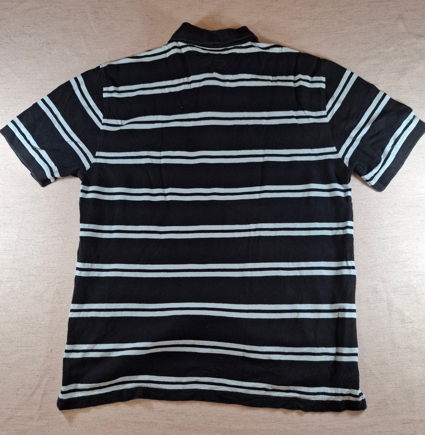 001299 Tommy Hilfiger Polo shirt size XL Black/ Lightblue stripes