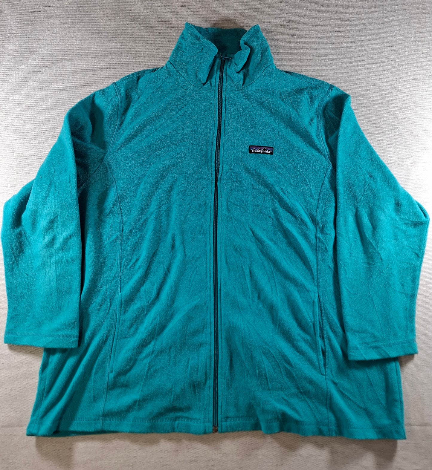 001502 – Patagonia Fleece Jacket – Turquoise, Size XL