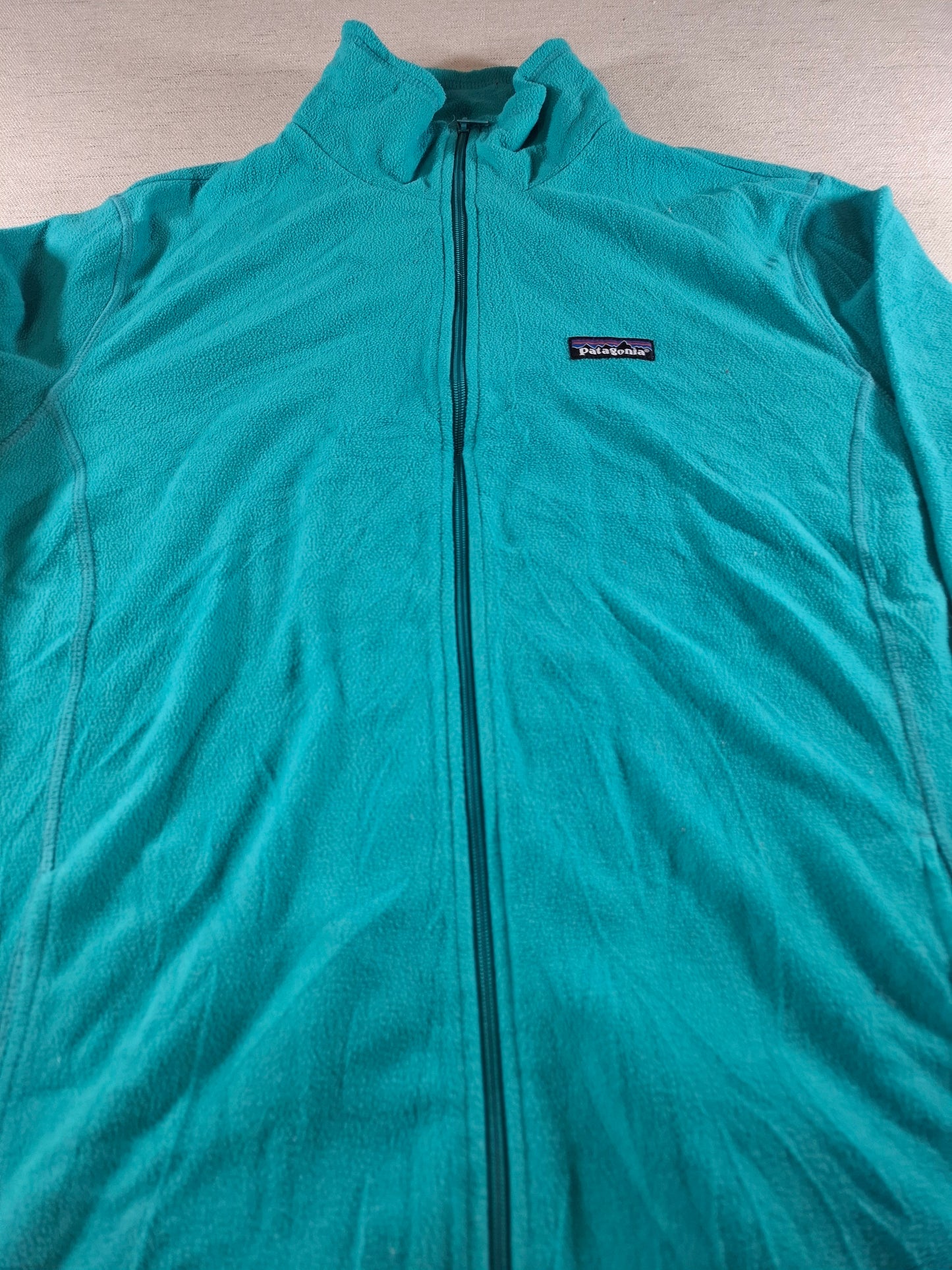001502 – Patagonia Fleece Jacket – Turquoise, Size XL