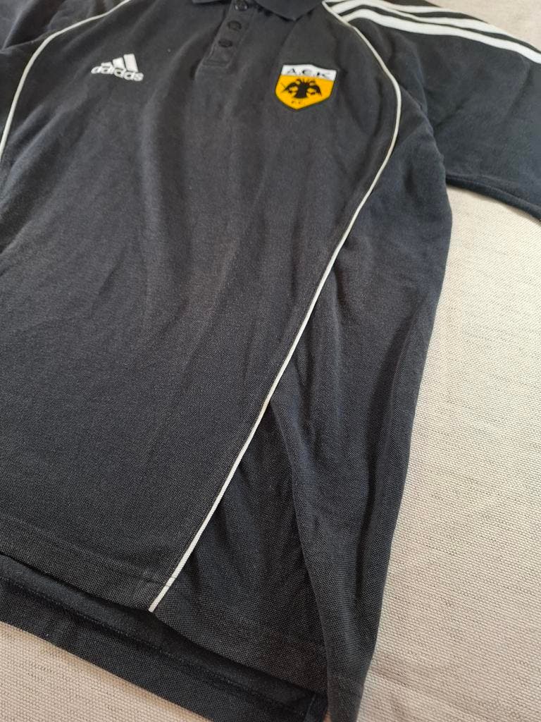 000127 – Adidas AEK Athens Polo – Black, Size L (UK 42/44)