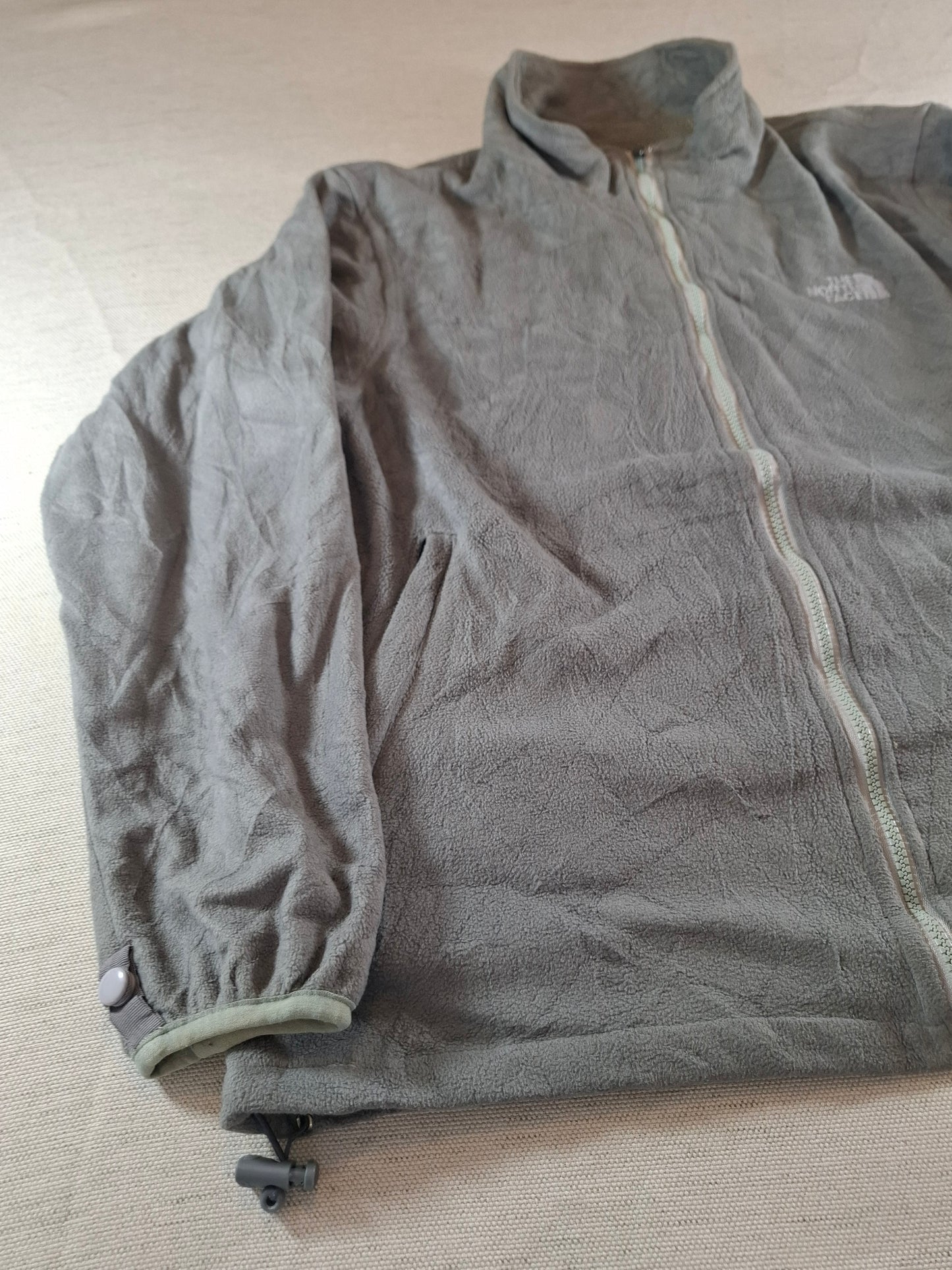 000697 The North Face Fleece size L Grey