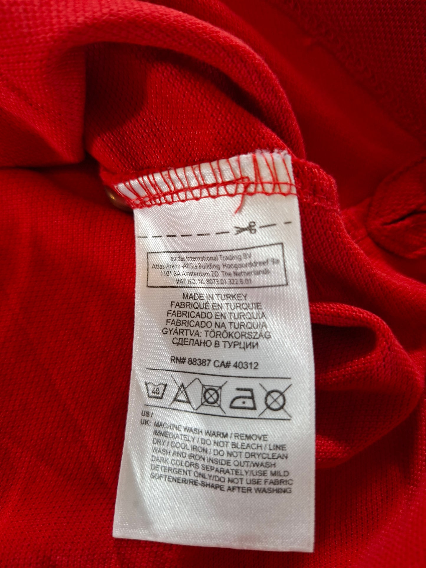 000945 Adidas Polo size XL Red