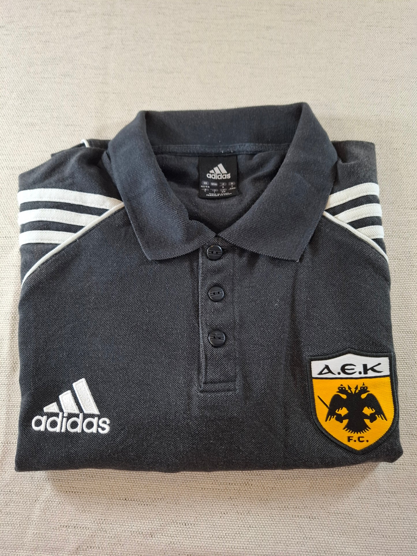 000127 Adidas AEK Athens polo size L (uk 42/44) Black