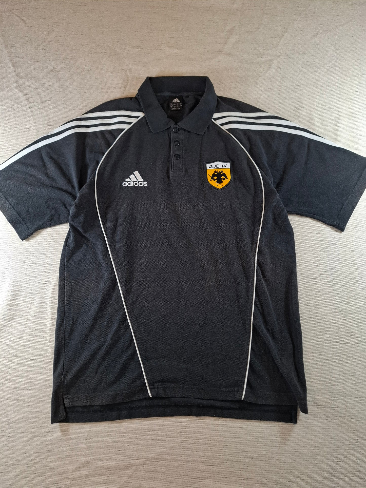 000127 Adidas AEK Athens polo size L (uk 42/44) Black