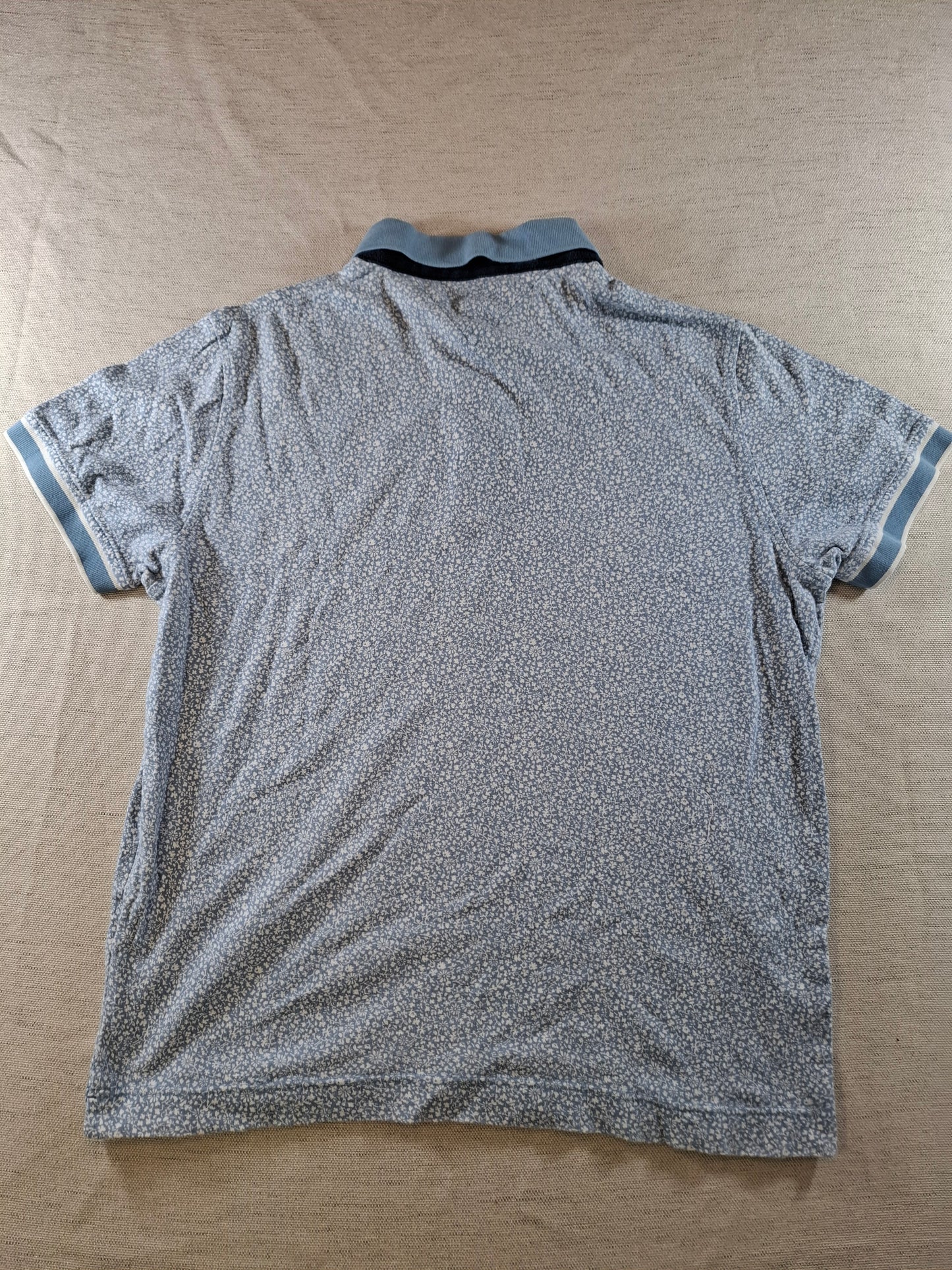 001058 Tommy Hilfiger Polo size L Light blue White