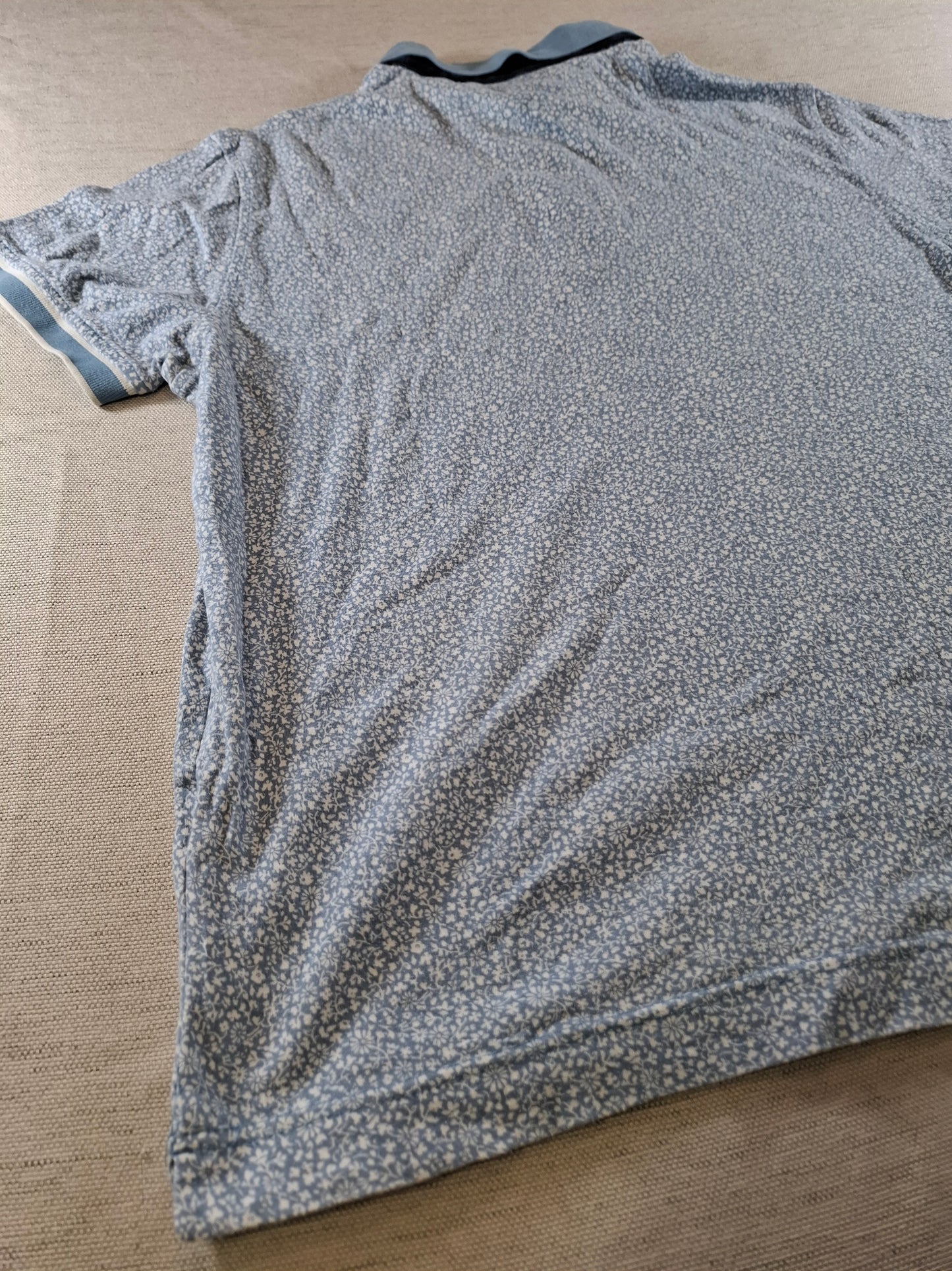 001058 Tommy Hilfiger Polo size L Light blue White