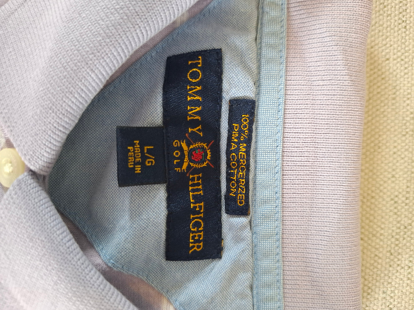 001113 Tommy Hilfiger Polo size L Lila/ White striped