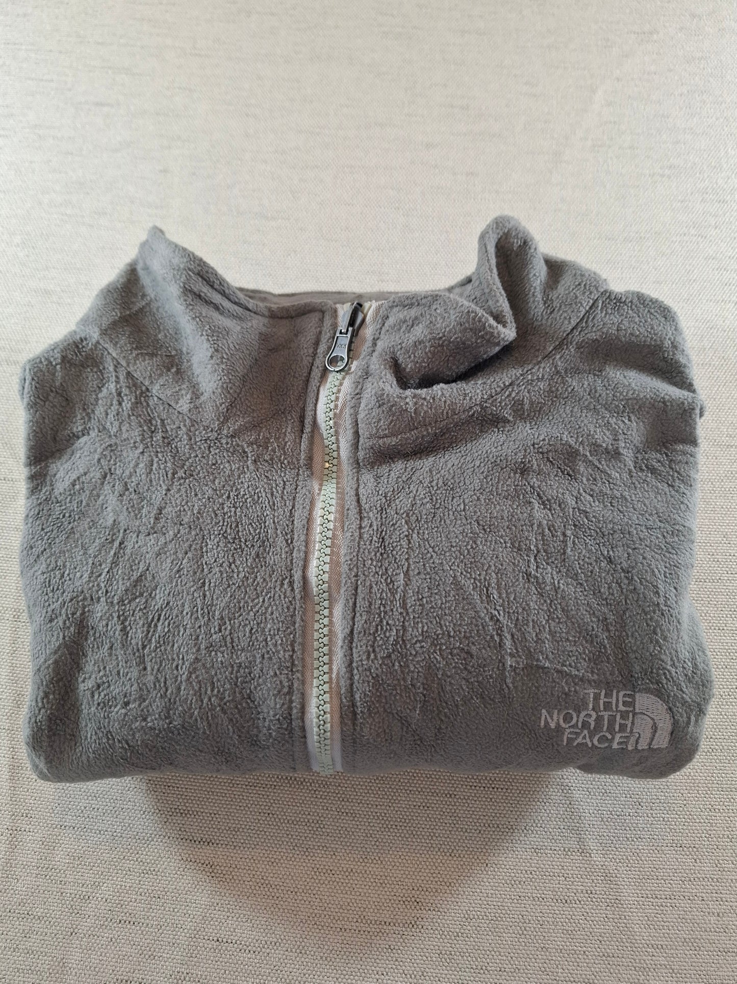 000697 The North Face Fleece size L Grey