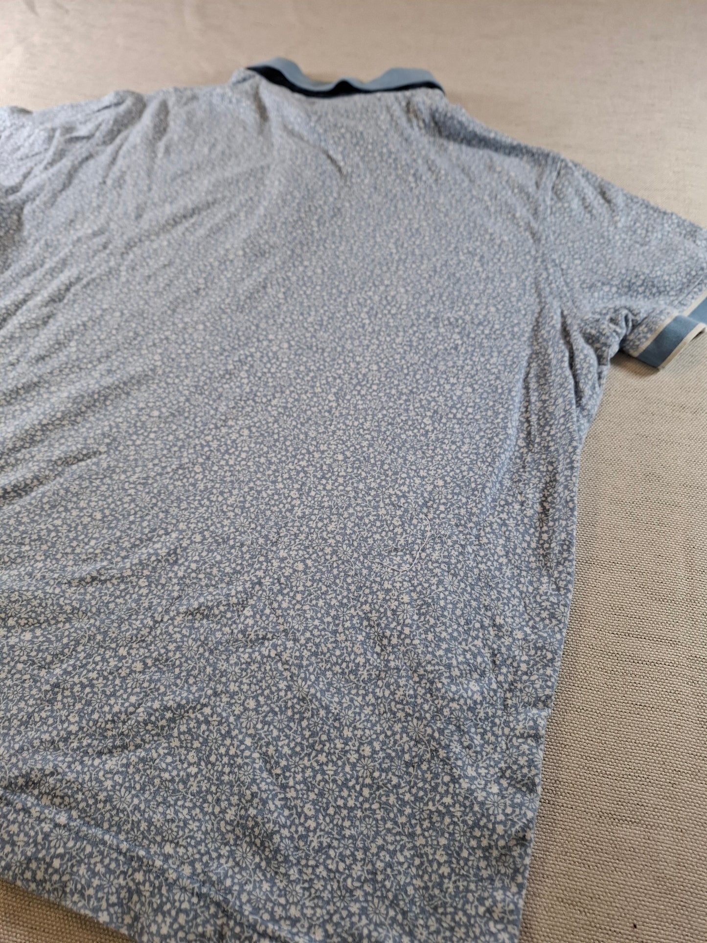 001058 Tommy Hilfiger Polo size L Light blue White