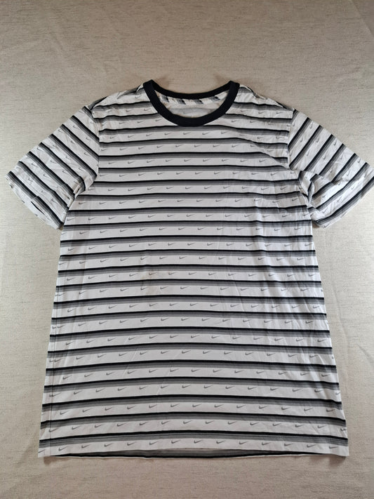 001132 Nike T-shirt size L Grey/ Black/ White + swoosh all over the shirt.