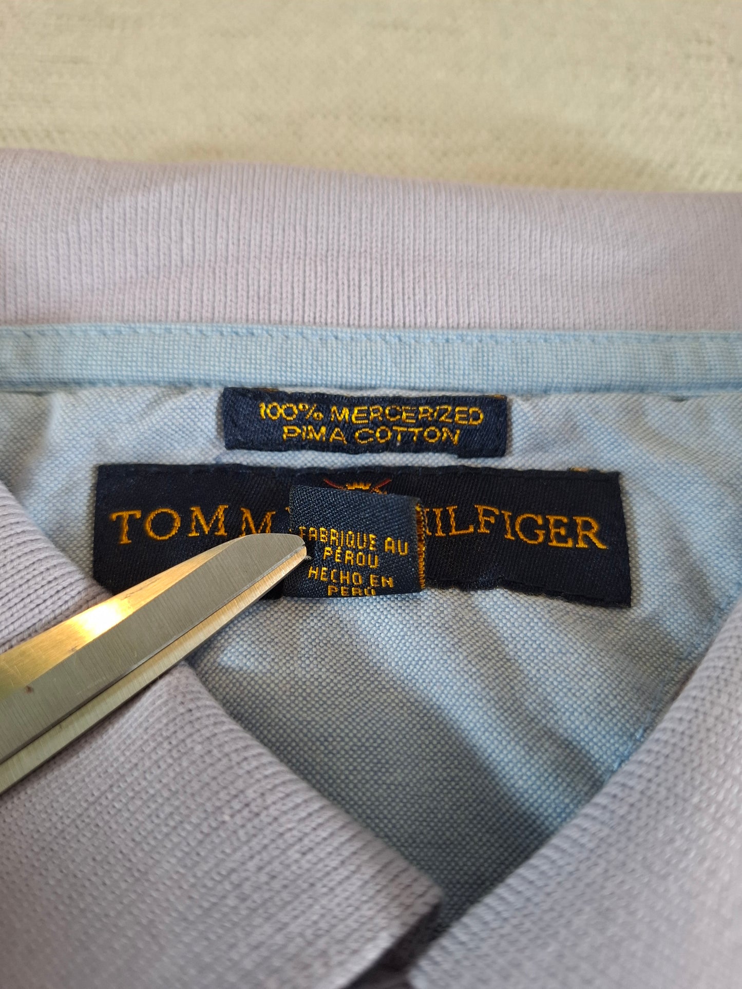 001113 Tommy Hilfiger Polo size L Lila/ White striped